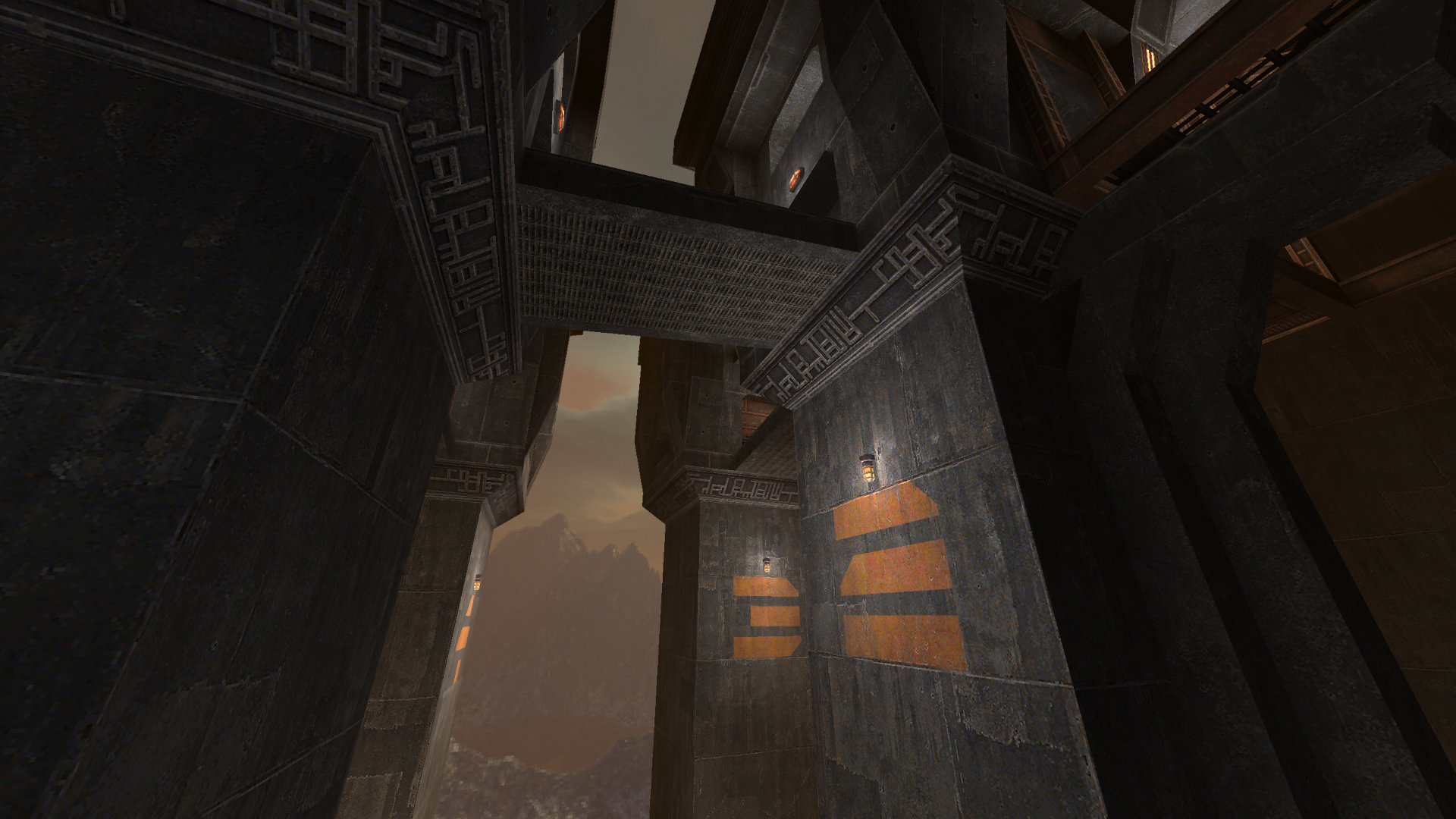 Screenshot from Quake, featuring 4 numbered towers made out of concrete.