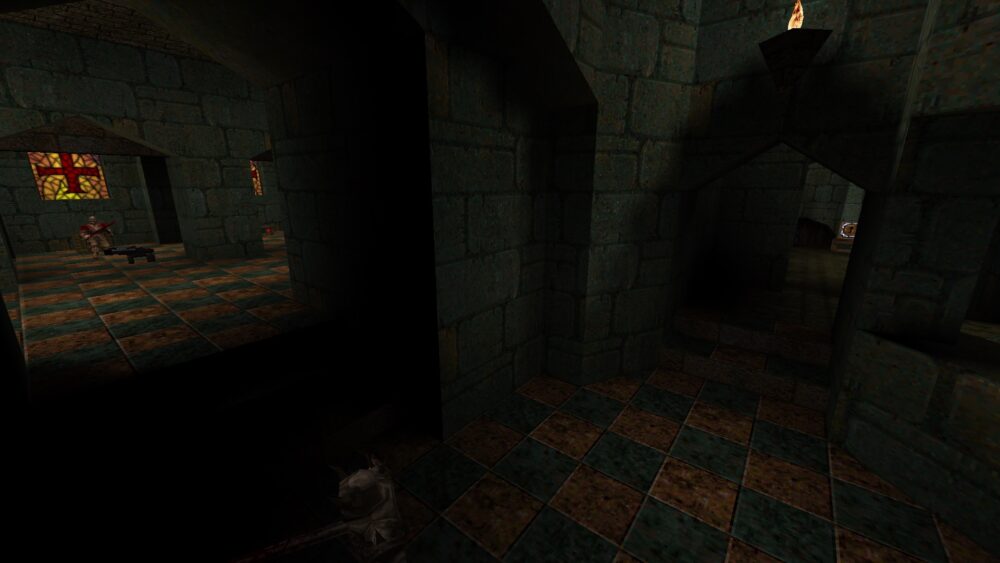 Screenshot from Quake, featuring a brown and green color scheme.